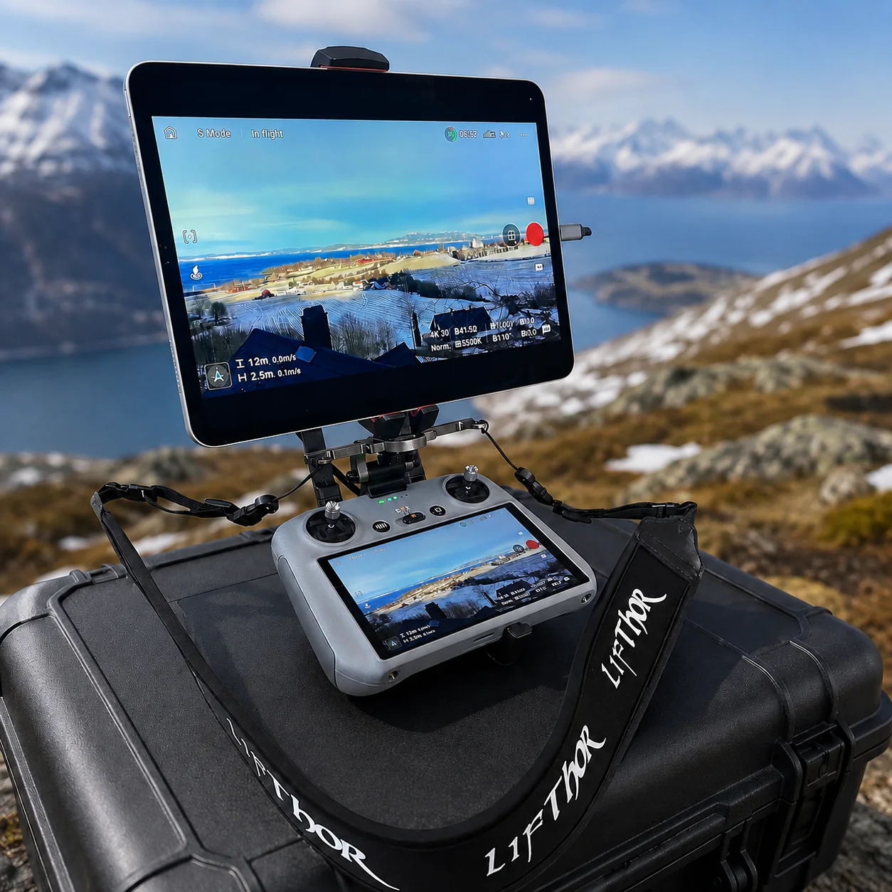 LifThor controller and tablet setup with a Norwegian fjord and mountains in the background